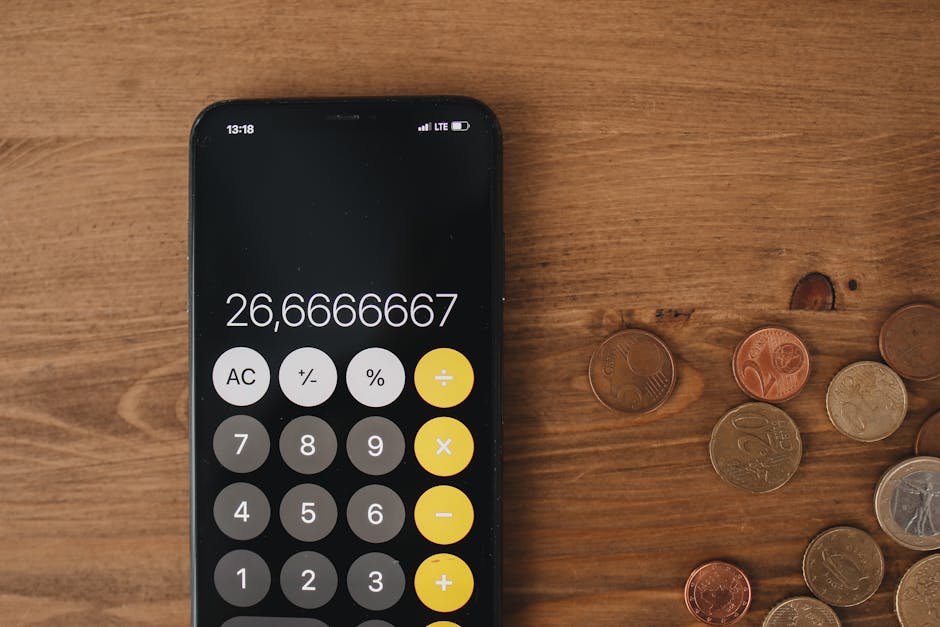 Calculator and stacked coins representing the EV calculation for the Smarkets COMMFREE 0% commission bonus
